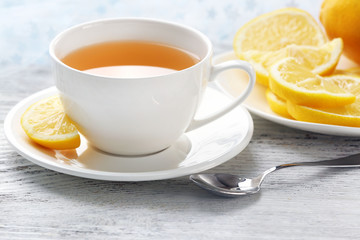 Cup of tea on a light wooden background