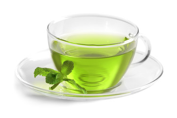 Cup of tea and mint isolated on white