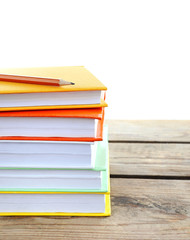 Few books and pencil on table