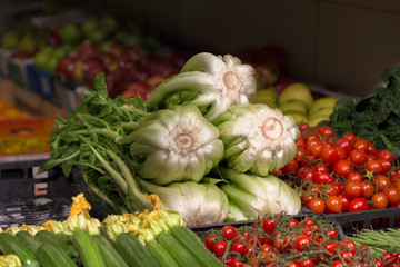 Market with various colorful fresh vegetables