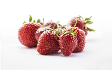 Strawberries fresh group isolated on white background close up in studio