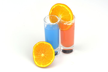 Beautiful row line of different colored alcohol cocktails
