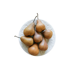 Pears on white plate