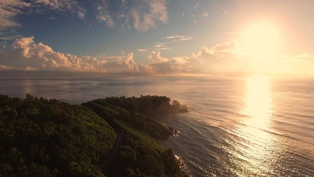 Aerial view of sunset on Anse Royale beach in Mahe Island, Seychelles