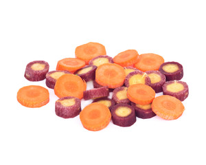 Sliced organic carrots separated on white background