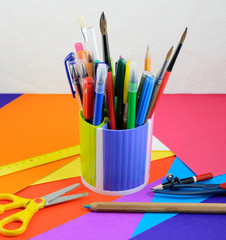 School and office supplies  on color paper