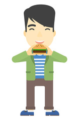 Man eating hamburger. 