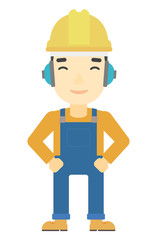 Man wearing hard hat and headphones 