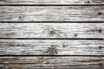Gray wooden natural desks background.