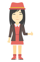 Woman showing thumbs up.