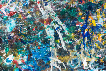 Beautiful texture of splash acrylic color on wood table.