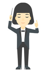 Conductor directing with her baton.