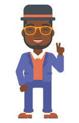 Man showing a sign of peace.