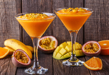 Tropical milkshake with ingredients.
