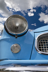 Detail of a vintage car light in colours