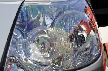 Closeup image of a modern car head lamp