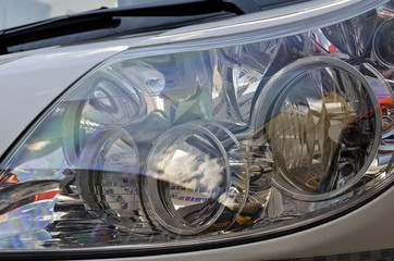 Closeup image of a modern car head lamp