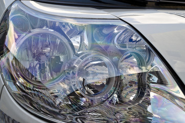 Closeup image of a modern car head lamp