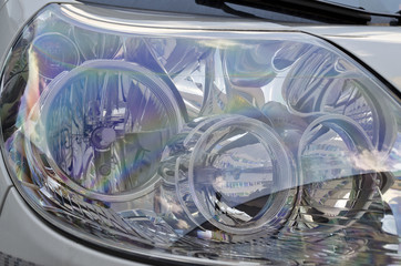 Closeup image of a modern car head lamp