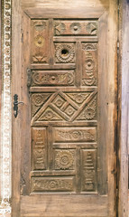Carved wooden door detail texture