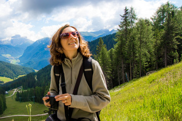 Woman looks the mountain landscape