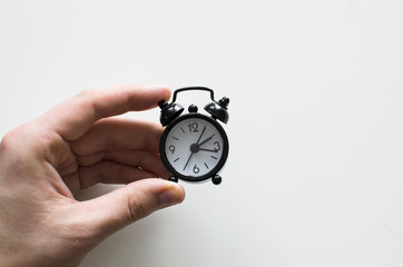 Alarm clock friends situation with hand