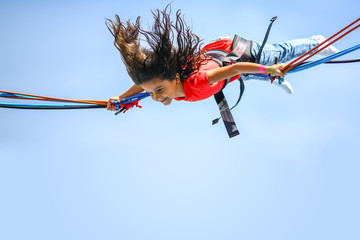 Girl bungee jumping trampoline Top