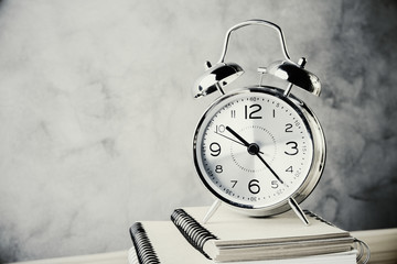 Alarm on concrete background