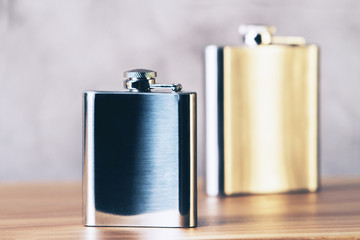 Golden and silver flask