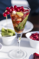 Fruit punch in glass by the seaside