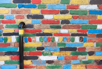 detail of a painted wall in Burano island, Venice
