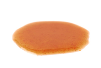 Puddle of a hot pepper sauce