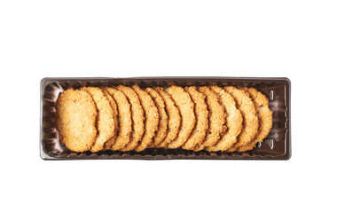 Plastic box filled with cookies isolated