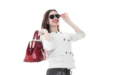 woman with red handbag in hands