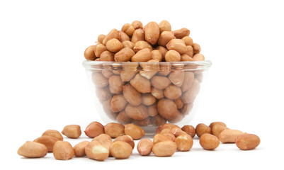 Fototapeta na wymiar Peanuts soybean on glass cup isolated