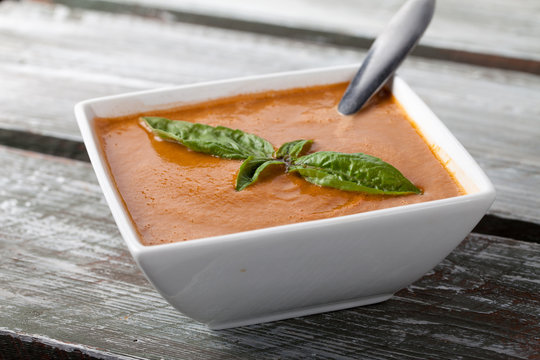 Organic Tomato Basil Soup on barn table