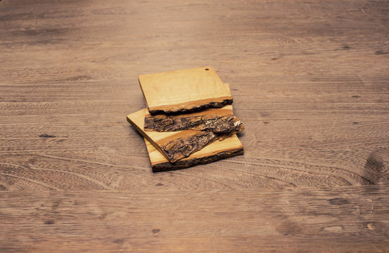 Wood Coasters On Wood Table