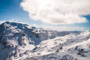 Fototapeta na wymiar Snowy mountain landscape in winter