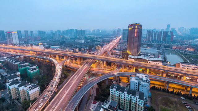 city interchange at dusk to night in hangzhou , road junction of urban expressway,time lapse.