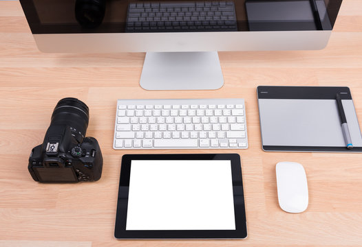 DSLR digital camera with tablet and computer PC