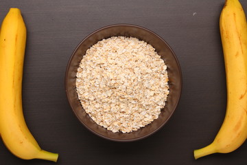 Oat flakes on table. Healthy food concept. Top view