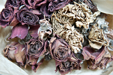 Close up of die roses on dried flower market for decoration. Bouquet. Past valentine day.