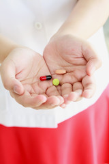 Pills medicine tablets in doctor hand