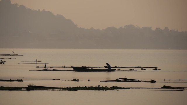 Fewa lake at sunset with boat on the lake