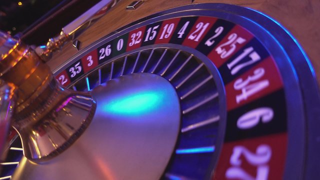 Turning Roulette Wheel in a casino - perspective view