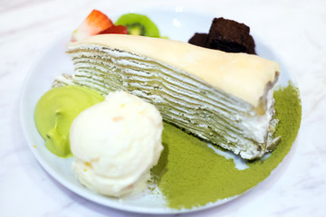 Uji Matcha Crepes Cake with vanilla ice cram, brownies and fruits topping