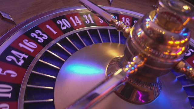 Roulette Wheel in a casino - 23 red wins