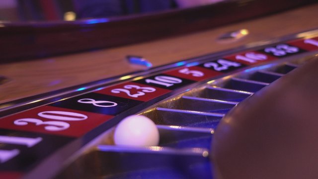 Macro view on a Roulette Wheel in a casino - 30 red wins