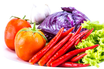 Vegetable and fruit on white plate