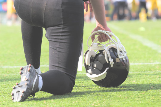 American football player waiting to join the game.